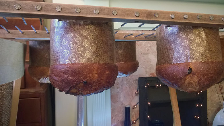 Panettone - cooling upside down. © Martin Belderson